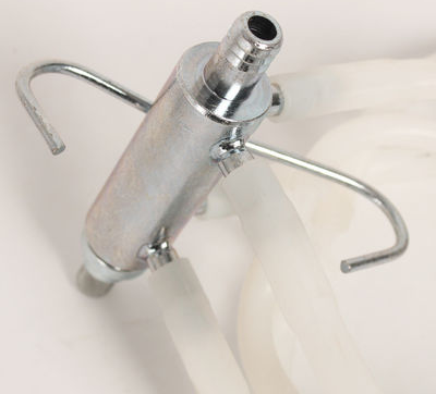 Milk claw outlet and support