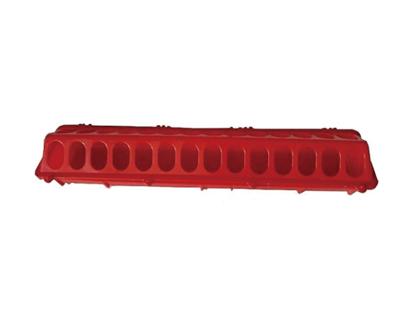 Poultry feeding trough with cover closed